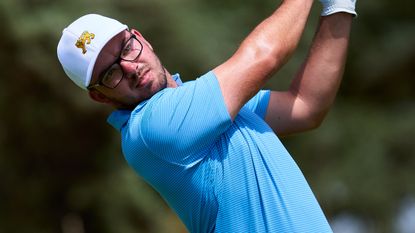 Eliot Baker takes a shot at the St Andrews Trophy 