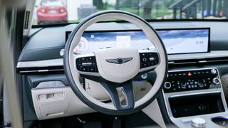 Steering wheel of the 2025 Genesis GV80 3.5T AWD Prestige.