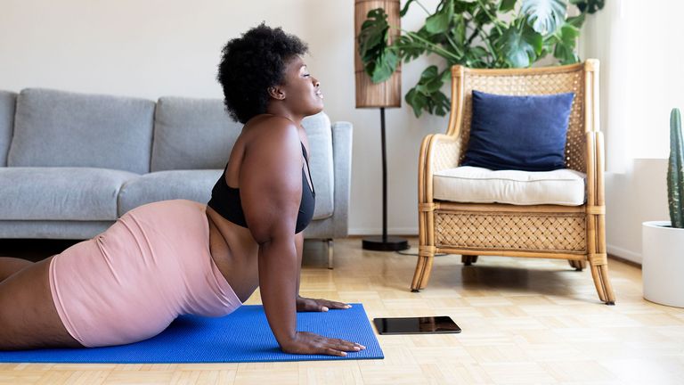 Woman doing a 15-minute yoga routine