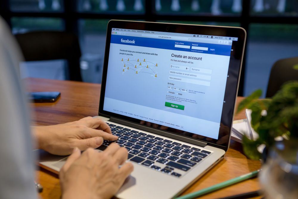 Facebook login page on laptop