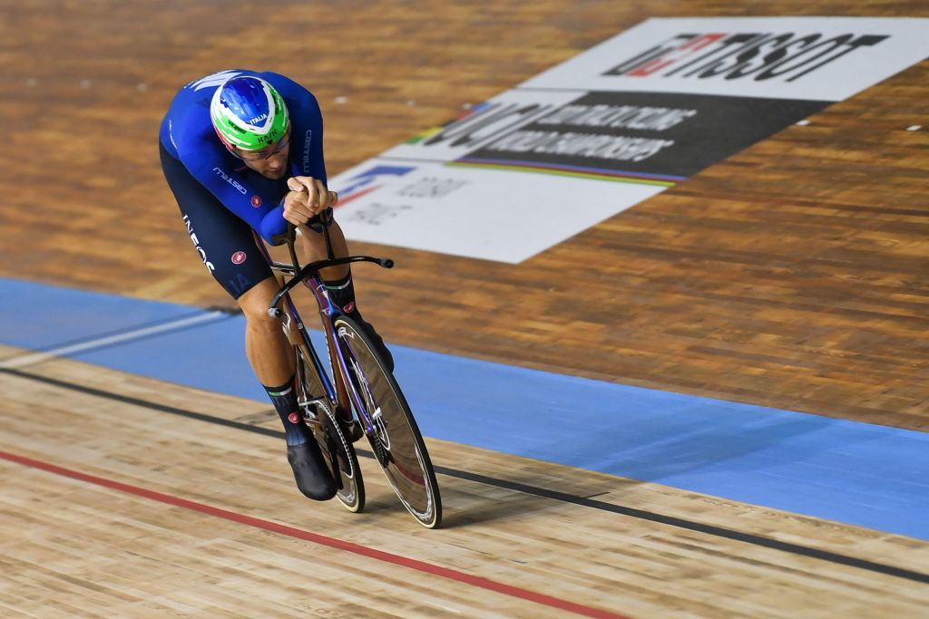 Italys Filippo Ganna competes in the mens Individual Pursuit qualifying during the UCI Track Cycling World Championships at The JeanStablinski Velodrome in Roubaix northern France on October 22 2021 Photo by Denis Charlet AFP Photo by DENIS CHARLETAFP via Getty Images