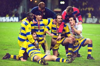 Parma players celebrate after winning the UEFA Cup final between Parma and Olympique Marseille at the Luzhniki Stadium on May 12, 1999 in Moscow, Russia. (Photo by Etsuo Hara/Getty Images)