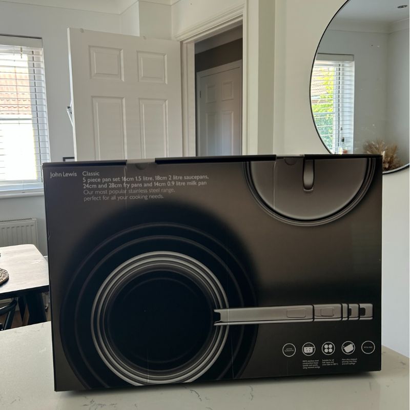 John Lewis Classic 5 Piece Pan Set in box on kitchen counter