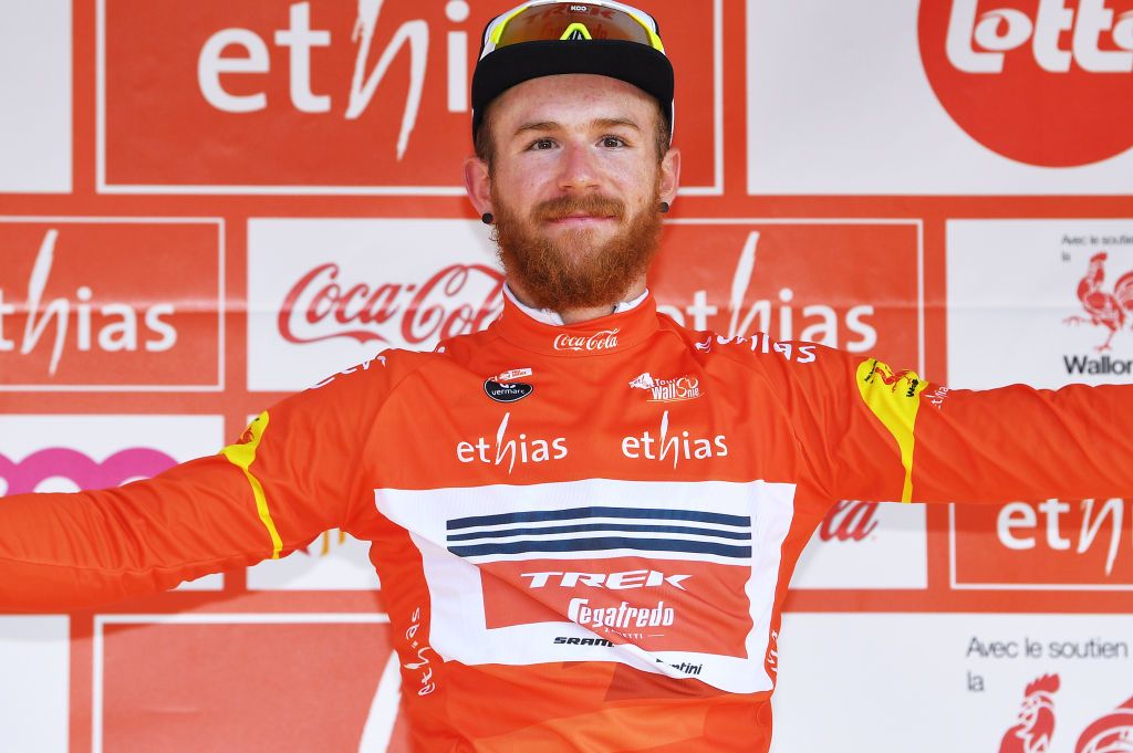 FLEURUS BELGIUM JULY 23 Quinn Simmons of United States and Team Trek Segafredo Orange Leader Jersey celebrates at podium during the 42nd Tour de Wallonie 2021 Stage 4 206km stage from Neufchteau to Fleurus tourdewallonie grandprixdewallonie on July 23 2021 in Fleurus Belgium Photo by Luc ClaessenGetty Images