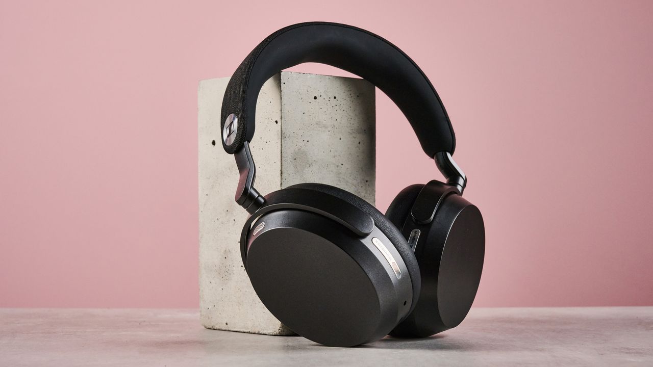 The Sennheiser Momentum 5 leaning against another concrete block.