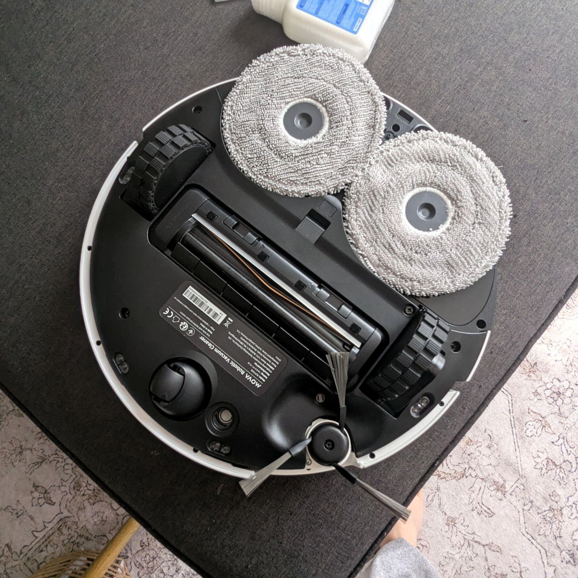 Underside of the MOVA P50 Pro Ultra Robot Vacuum, showing off the round mop pads