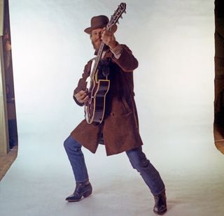 Levon Helm of the roots rock group The Band poses for a portrait in 1969 in Saugerties, New York.