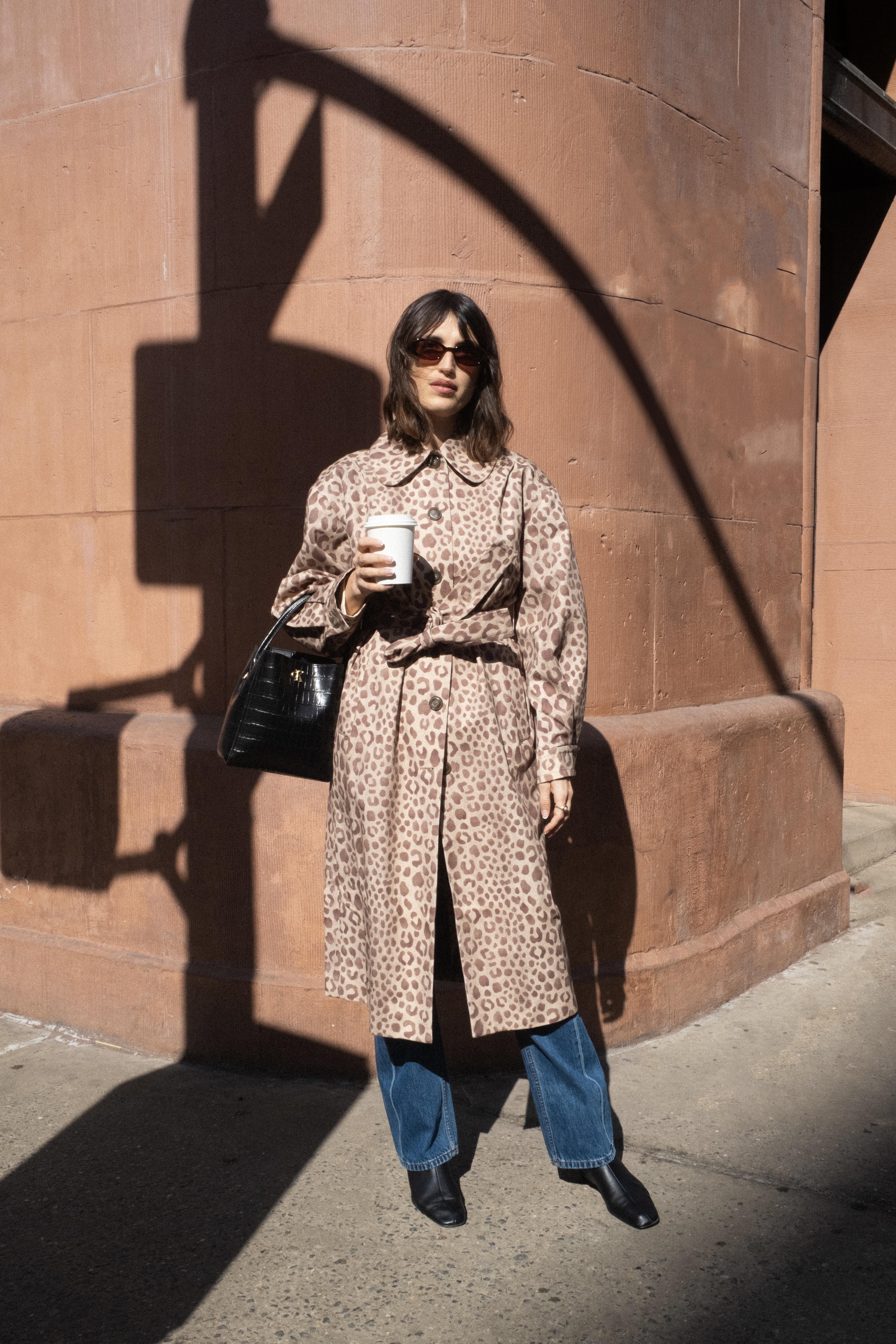 Jeanne Damas wearing a leopard print coat.