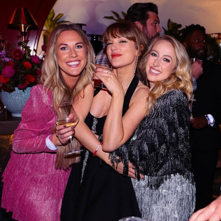 Taylor Swift posing with friends at her birthday party.