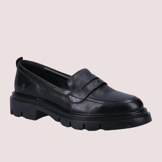 Flat lay image of black loafers 