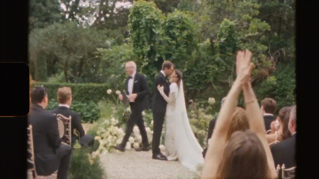 Abbie and Max kissing at the altar.