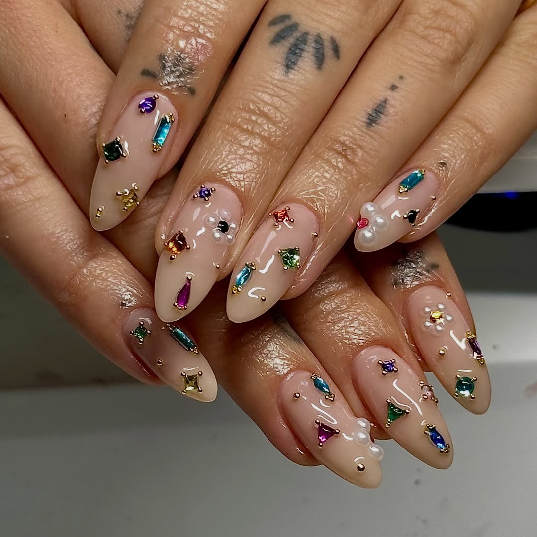 nude manicure with tiny colorful gems