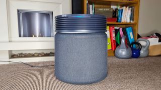 The Blueair Blue Signature air purifier standing in the middle of a living room