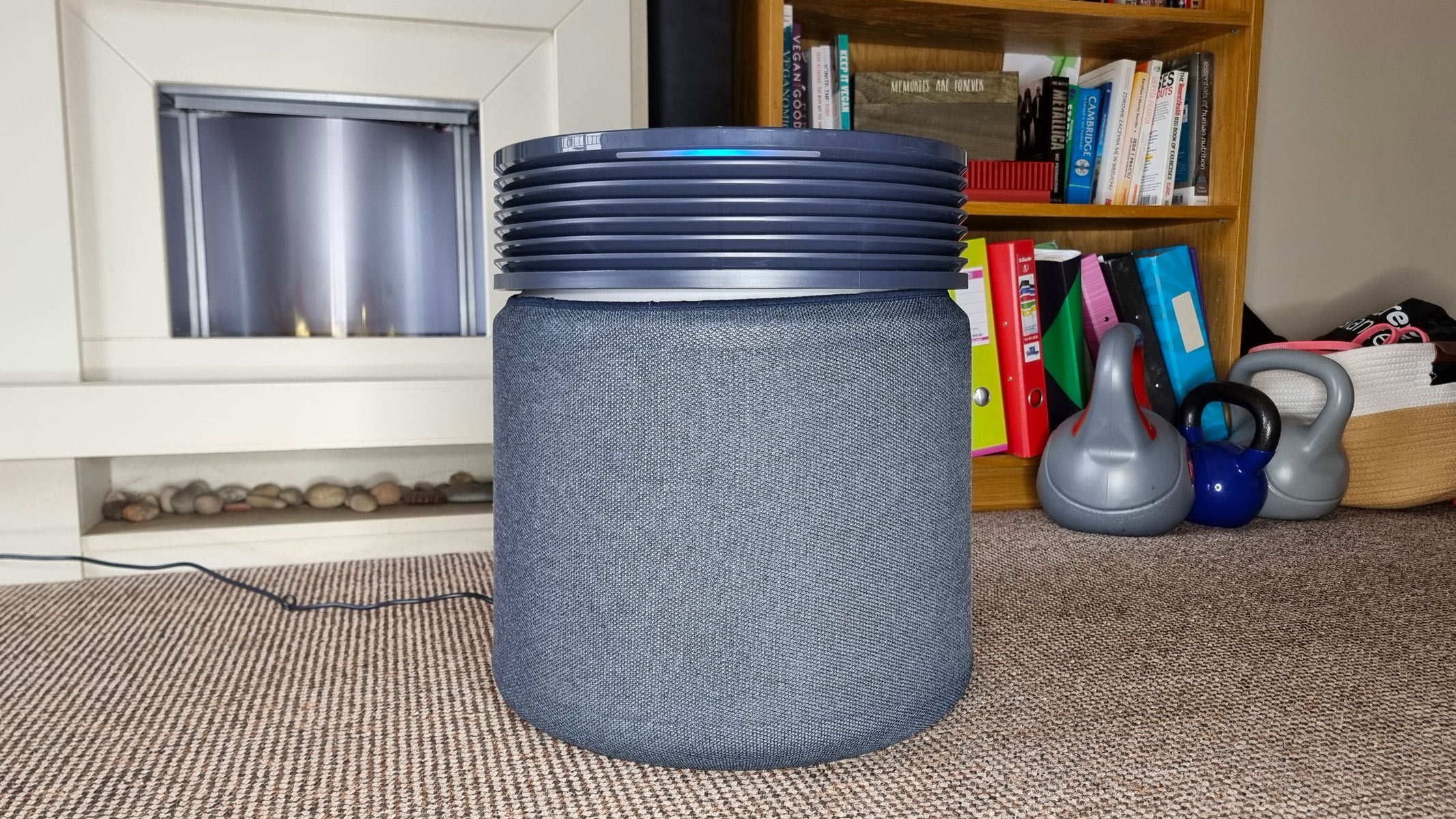 The Blueair Blue Signature air purifier standing in the middle of a living room