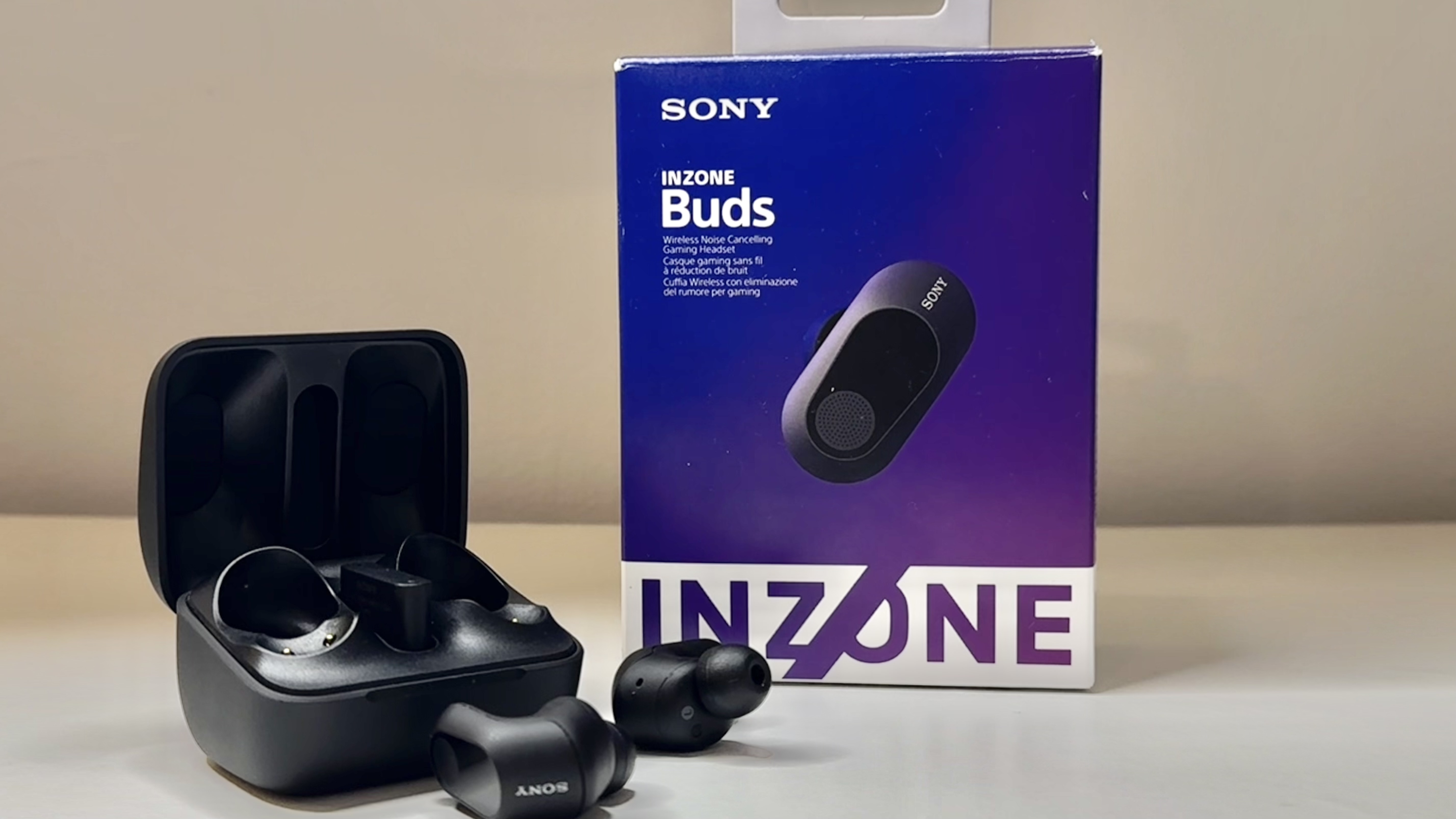 Sony InZone Buds on a desk with the packaging.