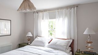 sheer curtains on window in bedroom