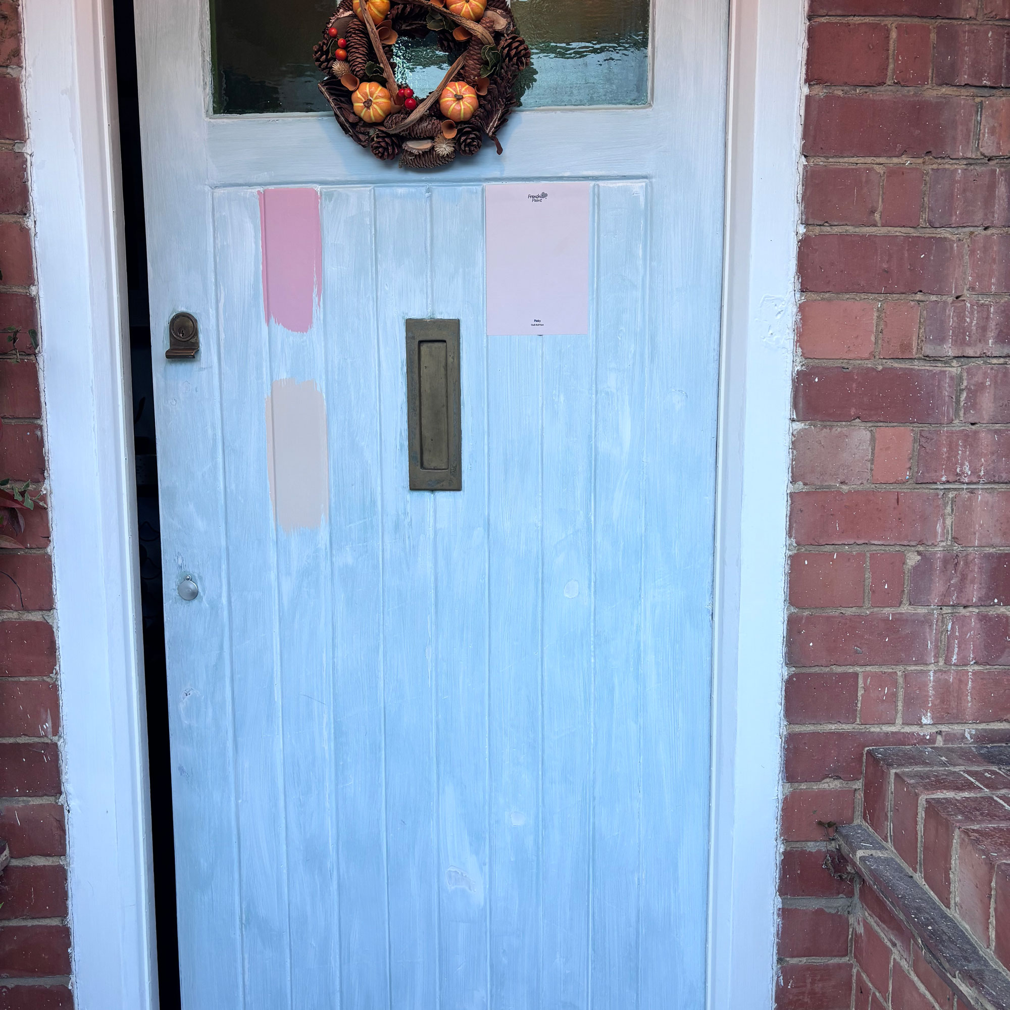 primed front door ready for painting