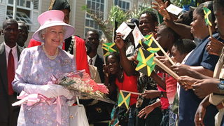 Britain's Queen Elizabeth visits Sam Sharpe Square February 20, 2002 while on a visit to Montego Bay, Jamaica