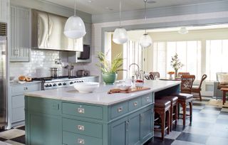 pastel green kitchen with checkerboard floor