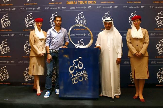 Vincenzo Nibali poses with the winner's trophy