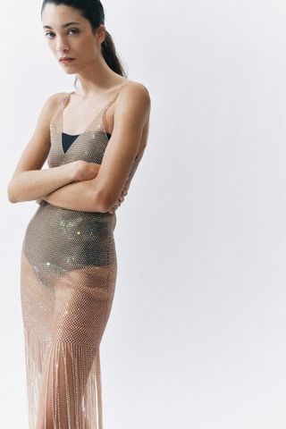 Zara model in mesh crystal dress