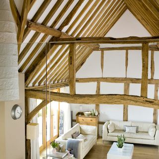 living space with ceiling beams