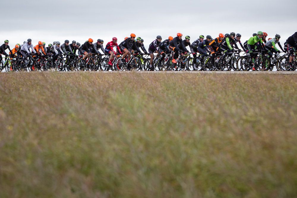 The peloton makes its way through the fields of Grande Prairie