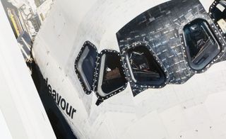 View of a white iPod aboard Space Shuttle Endeavour