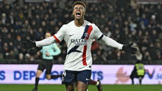 Desire Doue celebrates after scoring a goal during the French L1 football match between Metz and Paris Saint-Germain. 