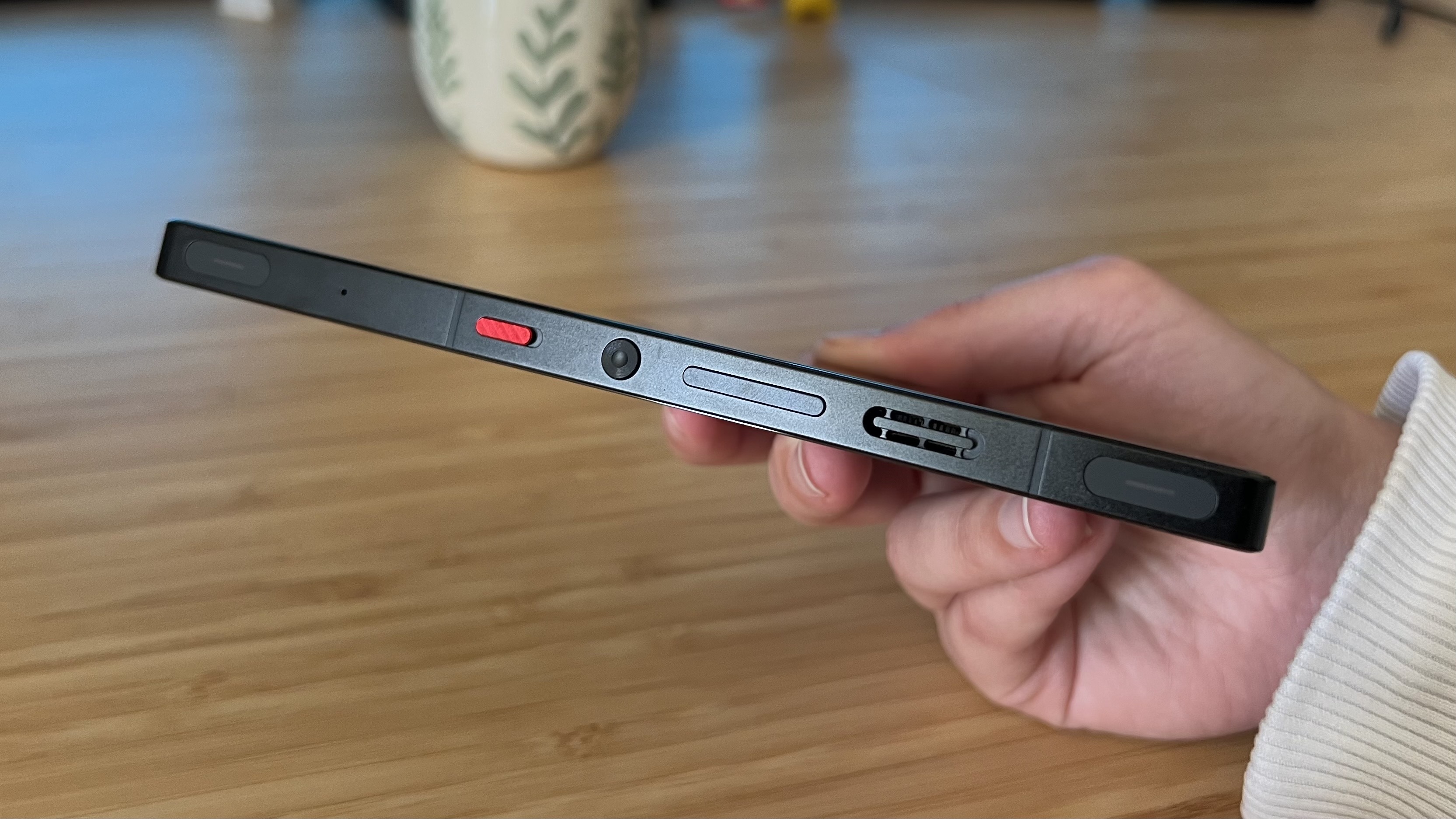 Side of RedMagic 10S Pro gaming phone showing touch sensors and Game Space toggle
