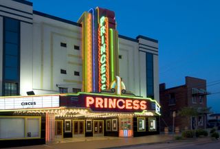 Art Deco neon marquee of the Princess Theater at dusk, was built in 1919 as a silent film and vaudeville playhouse. Today it is a performing arts venue and is on the National Register of Historic Places.