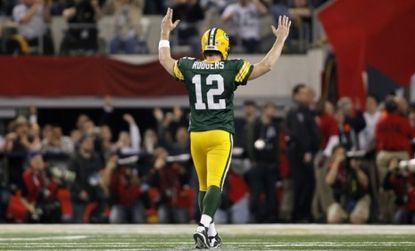 Green Bay Packers quarterback Aaron Rodgers celebrates a touchdown pass: NFL players may celebrate even more as the league's four-month lockout comes to an end.