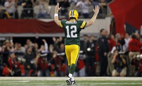 Green Bay Packers quarterback Aaron Rodgers celebrates a touchdown pass: NFL players may celebrate even more as the league&amp;#039;s four-month lockout comes to an end.