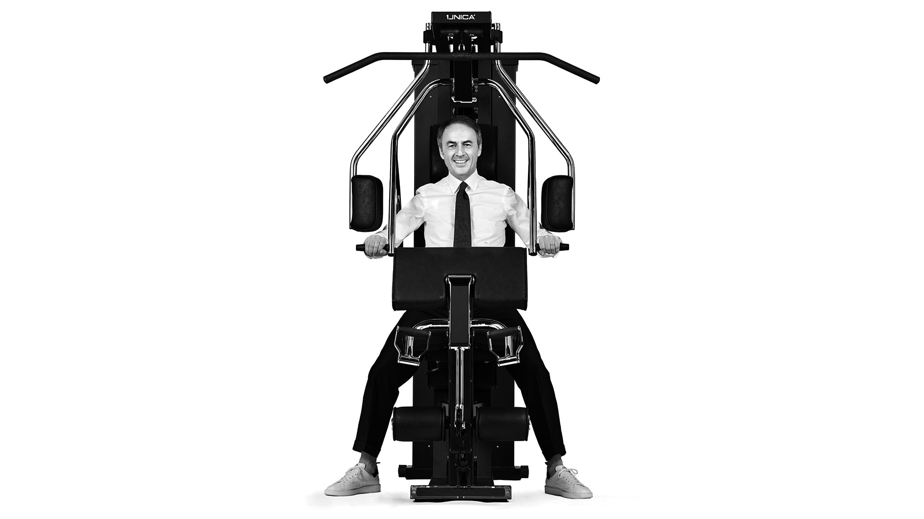 Technogym founder Nerio Alessandri on a Unica exercise machine