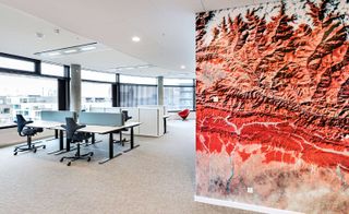 office area with red feature wall