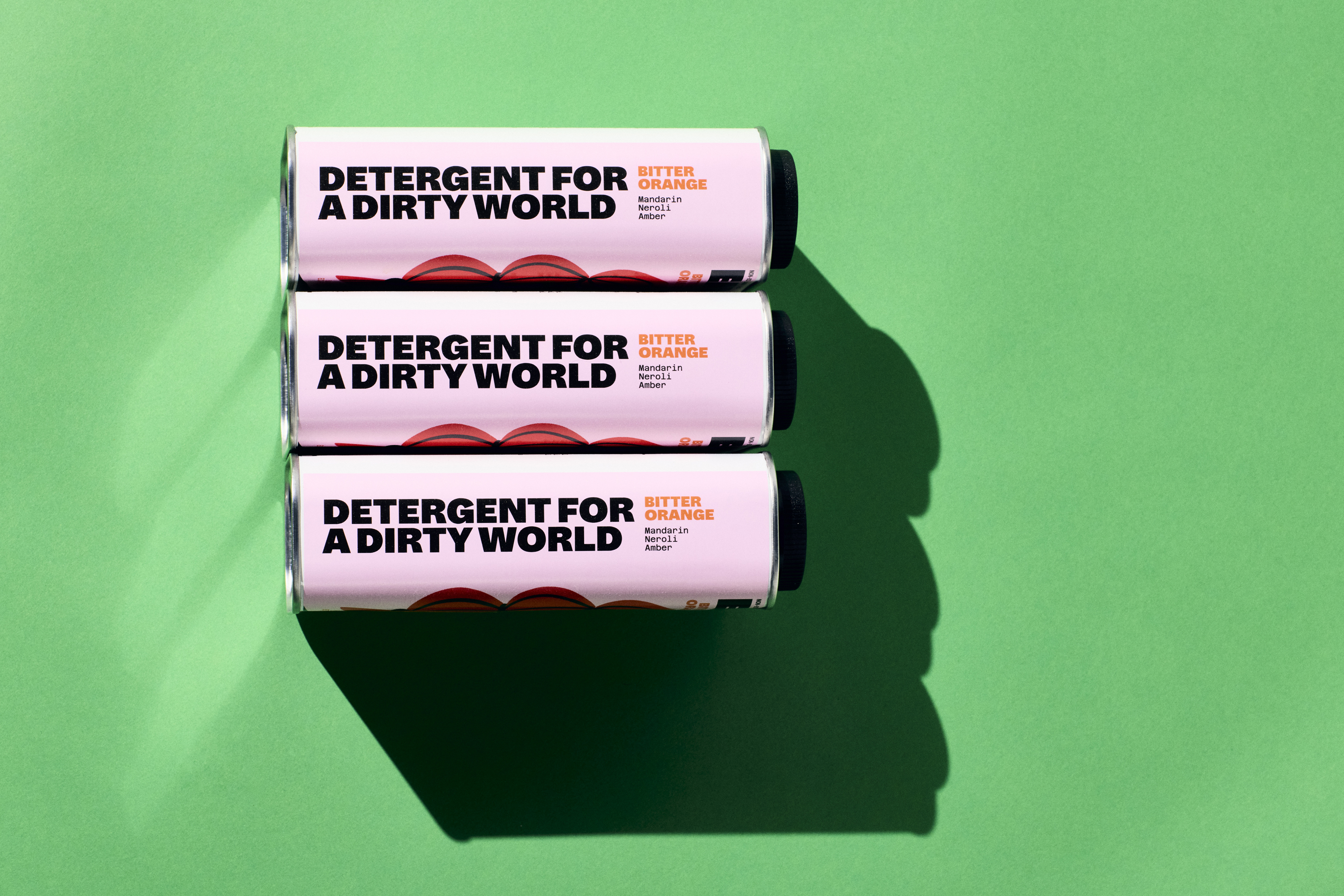 Eat Dirt laundry detergent in an illustrated tin