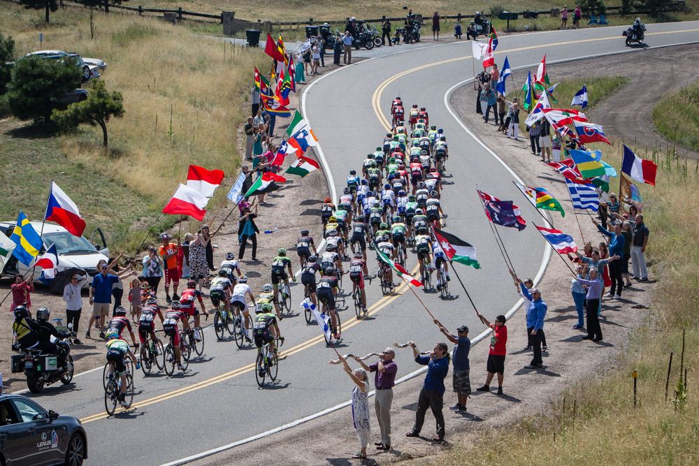 Fans wave flags along todays route