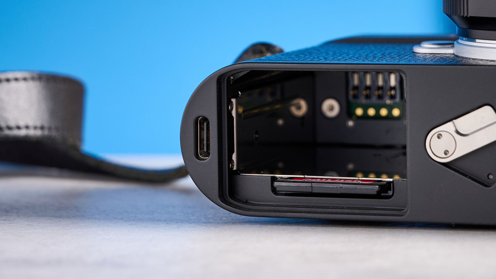 A black Leica M11-D rangefinder camera