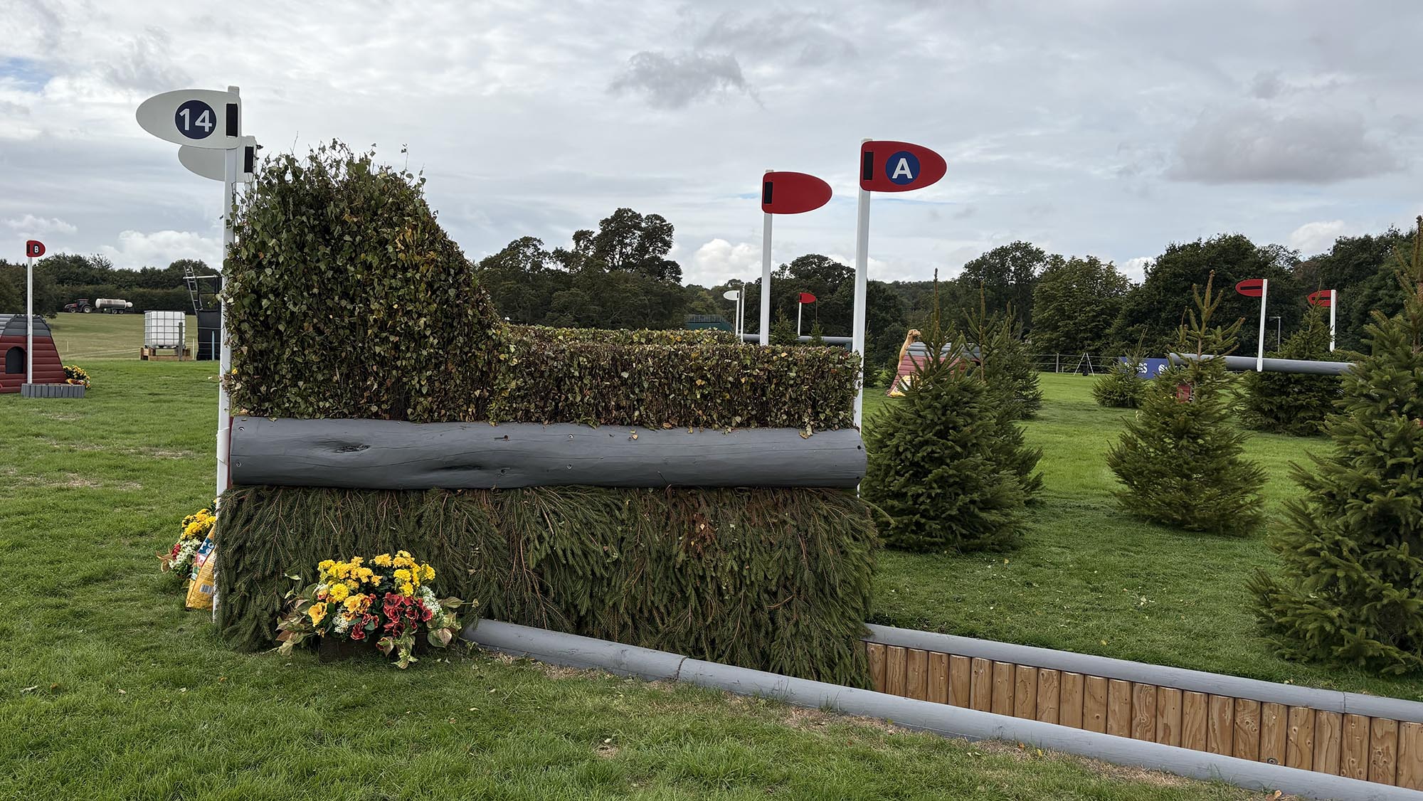 Brush spread oxer fence angled over a ditch on the Burghley cross-country course 2026