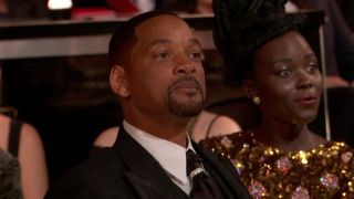 Will Smith glaring at Chris Rock at 94th Academy Awards