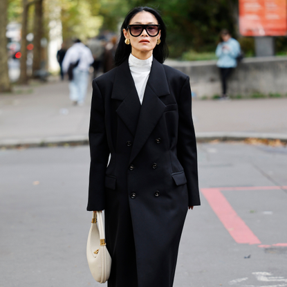 Woman wearing black tailored coats