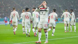 Diogo Dalot of Manchester United celebrates scoring his team's first goal during the UEFA Europa League 2024/25 League Phase MD8 match between Fotbal Club FCSB and Manchester United at National Arena Stadium on January 30, 2025 in Bucharest, Romania. 