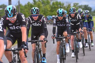 Chris Froome and Team Sky roll along during stage 1