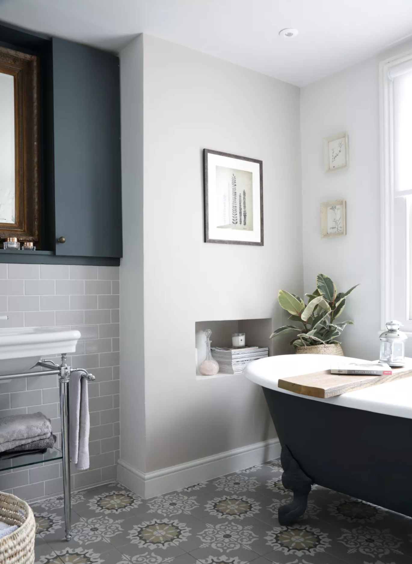 Grey bathroom with dark grey bath