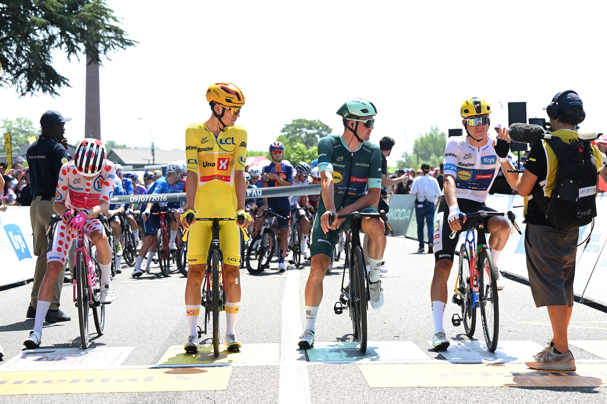 Stage 6 start in Pau are (L-R) Alex Baudin of France and Team EF Education - EasyPost - Polka dot Mountain Jersey, Torstein Traeen of Norway and Team Uno-X Mobility - Yellow Leader Jersey, Mads Pedersen of Denmark - Green Sprint Jersey, Mathias Vacek of Czech Republic and Team Lidl - Trek - White best Young Rider Jersey