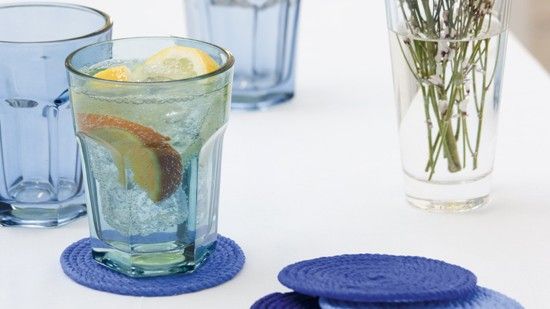 glasses with lemon slice on blue roap coaster 