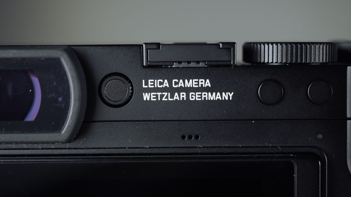Leica Q3 Monochrom on a wooden surface