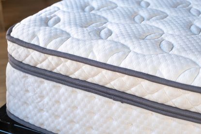 How to buy a mattress: A close-up of the corner of a mattress