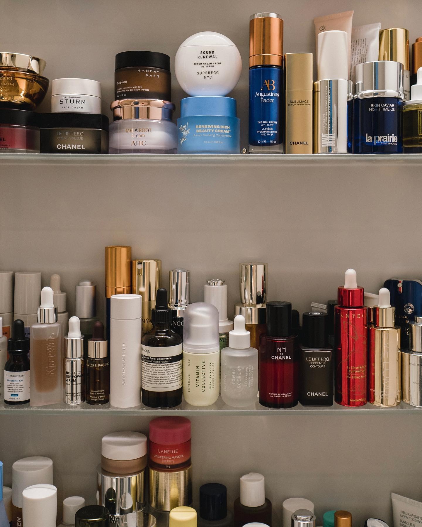 A photo of several skincare products on a shelf