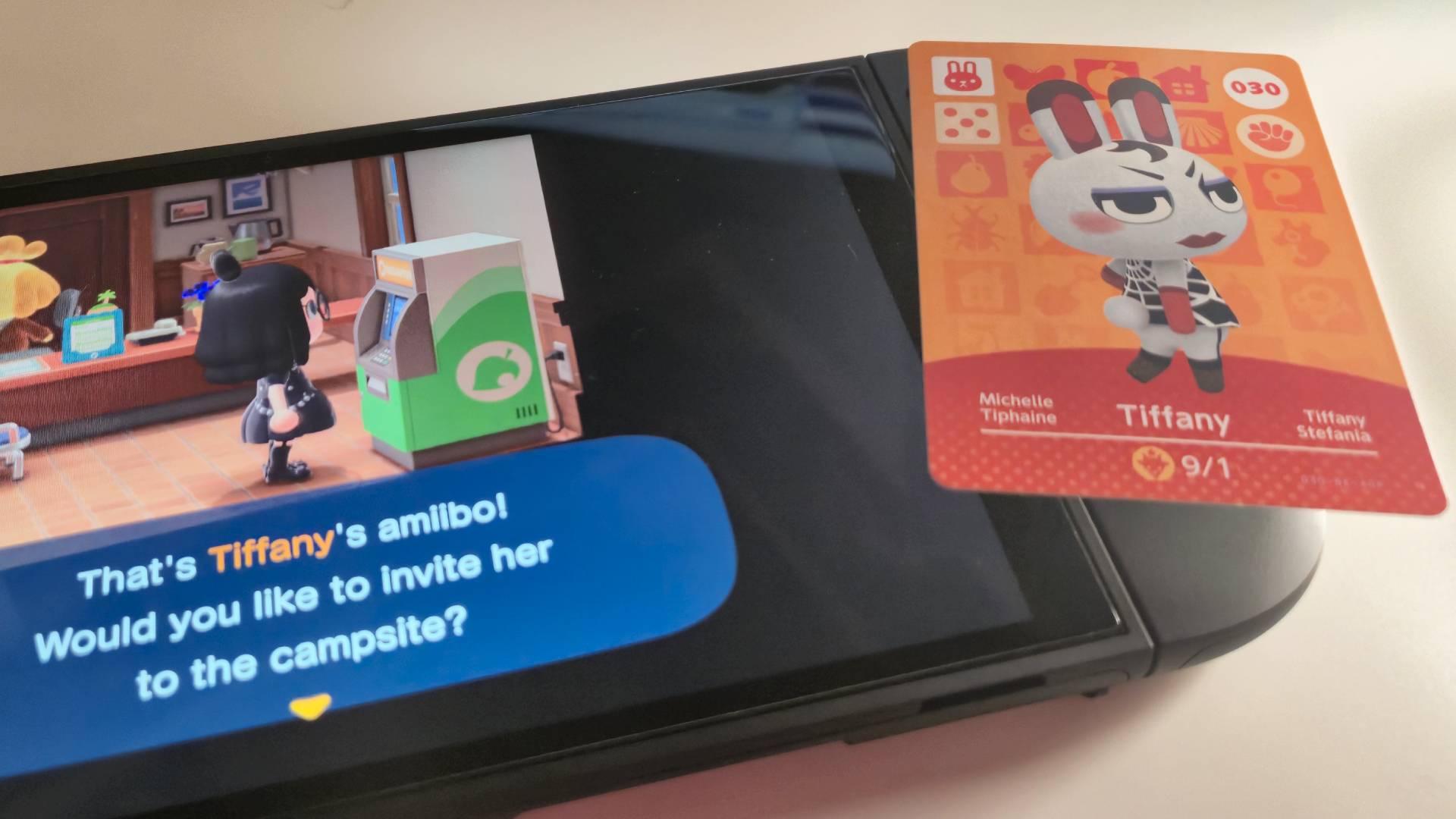 Photo of a Tiffany amiibo card sitting on the Switch 2 right Joy-con controller.
